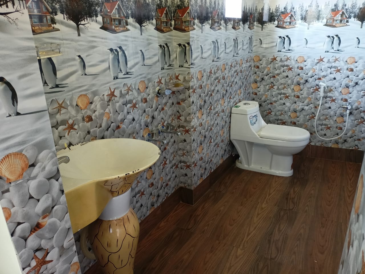 Attached bathroom with western toilet, wash basin and health faucet